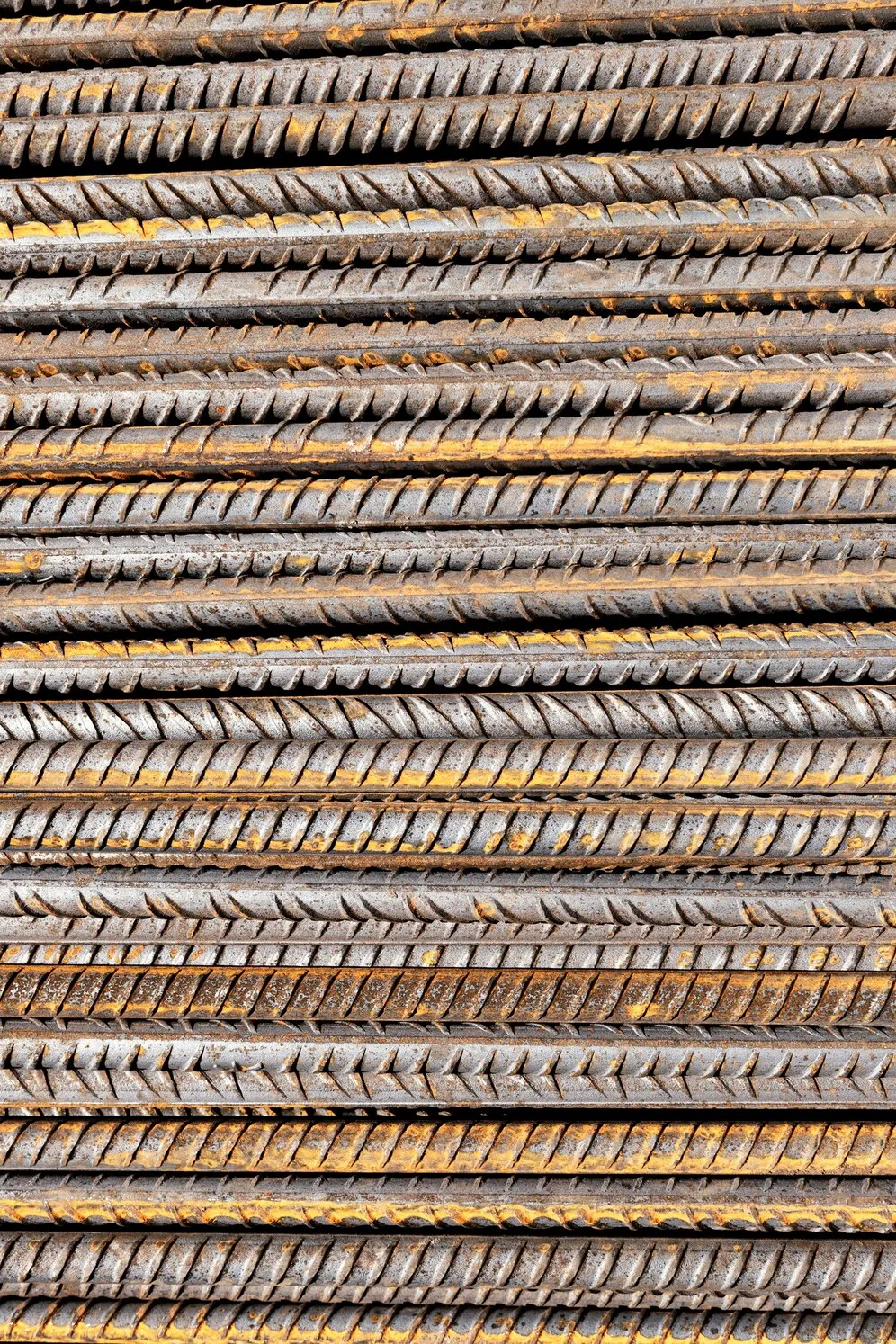Precision-cut rebars stacked together, displaying uniform dimensions and finish